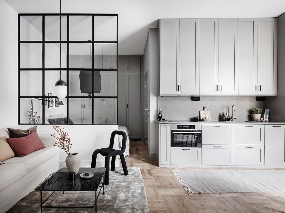 Cocina y salon con pared de cristal. Muros de cristal